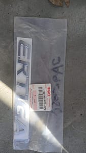 Suzuki Ertiga OEM Badge/Emblem - Genuine New Logo for Enhanced Appeal