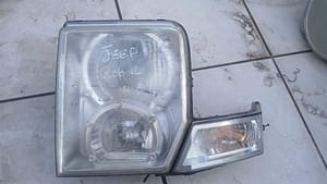 2011 Jeep Cherokee Left headlight